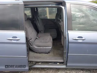 2007 Honda Odyssey EX z VIN 5FNRL38467B087065, wystawiony jako IAAI lot #42204370 z przebiegiem 242 844 mil mil oraz . Historia ofert i sprzedaży dostępna na DreamBid. Obrazek 8.