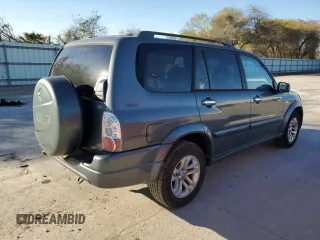 2005 Suzuki XL7 LX z VIN JS3TY92V554107839, wystawiony jako Copart lot #88328455 z przebiegiem 122 912 mil mil oraz Szkoda całkowita • Salvage title. Historia ofert i sprzedaży dostępna na DreamBid. Obrazek 3.