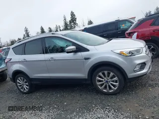 2017 Ford Escape Titanium with VIN 1FMCU9J97HUE98023, listed as a IAAI auction lot 41745843 with 24,857 mi miles. Bid and sale history available at carsss.com. Image 12.