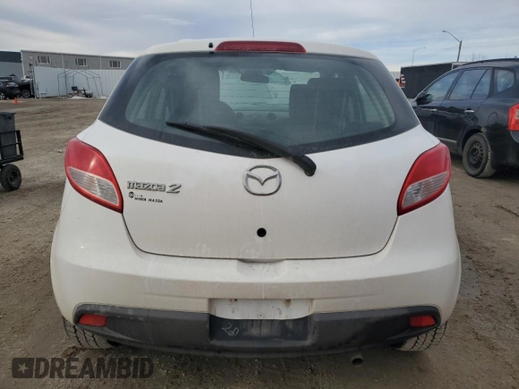 2012 Mazda 2 Sport with VIN JM1DE1KY8C0145089, listed as a Copart auction lot 52093925 with 211,282 mi miles and Salvage Title. Bid and sale history available at DreamBid. Image 6.