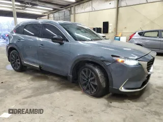 2021 Mazda CX-9 Carbon Edition with VIN JM3TCADY2M0527657, listed as a Copart auction lot 46650145 with 69,439 mi miles and Salvage title. Bid and sale history available at DreamBid. Image 4.