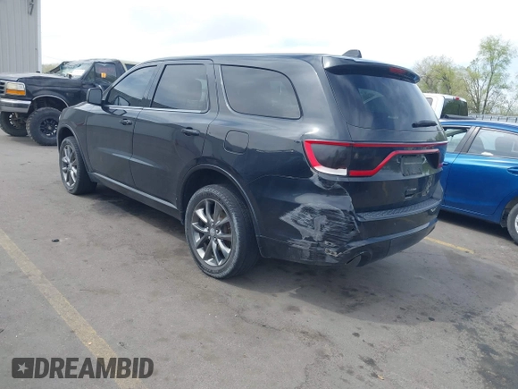 2015 Dodge Durango SXT with VIN 1C4RDJAGXFC796034, listed as a IAAI auction lot 42057983 with 159,108 mi miles and . Bid and sale history available at DreamBid. Image 3.