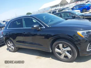2019 Audi Q3 Premium with VIN WA1AECF33K1086047, listed as a IAAI auction lot 41905218 with 51,802 mi miles. Bid and sale history available at carsss.com. Image 13.