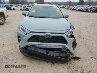 2019 Toyota RAV4 Hybrid XLE with VIN JTMRWRFV0KD011136, listed as a Copart auction lot 44007925 with 70,364 mi miles and Salvage Title. Bid and sale history available at carsss.com. Image 5.
