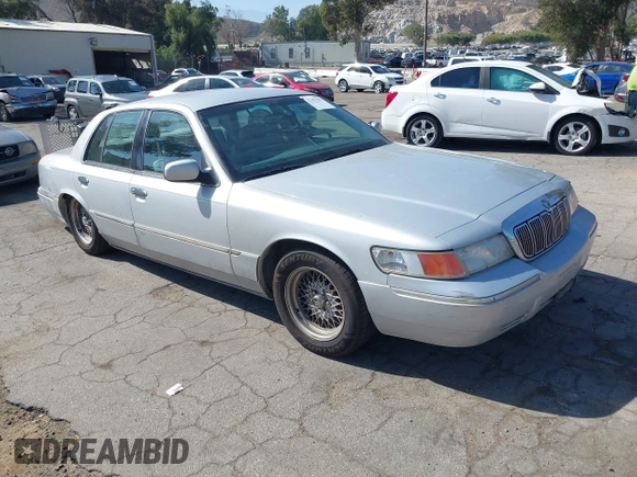 2002 Mercury Grand Marquis LS Premium z VIN 2MEFM75W82X653148, wystawiony jako IAAI lot #42307985 z przebiegiem 92 233 mil mil oraz . Historia ofert i sprzedaży dostępna na DreamBid. Obrazek 1.