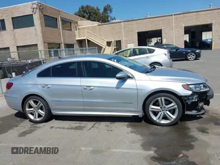 2014 Volkswagen CC R-Line with VIN WVWBP7AN0EE527649, listed as a IAAI auction lot 42009588 with 122,964 mi miles. Bid and sale history available at carsss.com. Image 14.