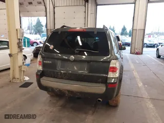 2008 Mercury Mariner with VIN 4M2CU81Z38KJ19197, listed as a IAAI auction lot 41233891 with 168,131 mi miles. Bid and sale history available at carsss.com. Image 16.