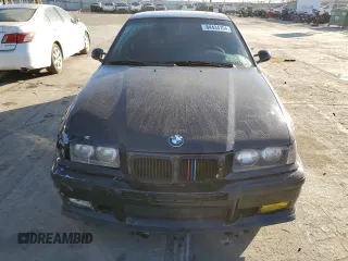 1998 BMW M3 z VIN WBSCD932XWEE08919, wystawiony jako Copart lot #84434704 z przebiegiem Nie podano mil oraz Szkody całkowita. Historia ofert i sprzedaży dostępna na DreamBid. Obrazek 5.