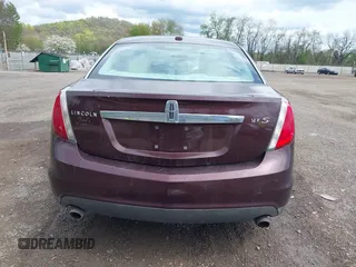2009 Lincoln MKS z VIN 1LNHM93R09G612169, wystawiony jako IAAI lot #42126437 z przebiegiem 158 393 mil mil oraz . Historia ofert i sprzedaży dostępna na DreamBid. Obrazek 17.