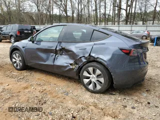 2023 Tesla Model Y Long Range z VIN 7SAYGDEE5PA164270, wystawiony jako Copart lot #50260835 z przebiegiem 17 340 mil mil oraz Szkoda całkowita • Salvage title. Historia ofert i sprzedaży dostępna na DreamBid. Obrazek 2.