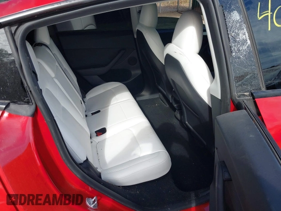 2023 Tesla Model Y Performance with VIN 7SAYGDEF6PF870935, listed as a IAAI auction lot 40718563 with 15,286 mi miles and . Bid and sale history available at DreamBid. Image 8.