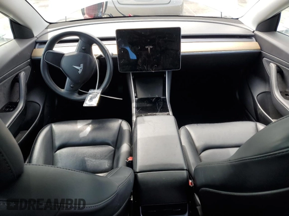 2020 Tesla Model 3 Standard Range Plus z VIN 5YJ3E1EA6LF634067, wystawiony jako Copart lot #50718645 z przebiegiem 26 605 mil mil oraz Szkoda całkowita • Salvage title. Historia ofert i sprzedaży dostępna na DreamBid. Obrazek 8.