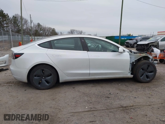 2020 Tesla Model 3 Standard Range Plus with VIN 5YJ3E1EA1LF799766, listed as a IAAI auction lot 41386508 with 90,000 mi miles. Bid and sale history available at carsss.com. Image 14.