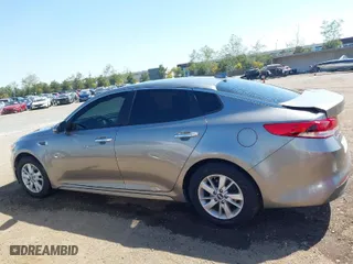 2016 Kia Optima LX with VIN 5XXGT4L39GG116566, listed as a IAAI auction lot 41949407 with 82,679 mi miles. Bid and sale history available at carsss.com. Image 15.
