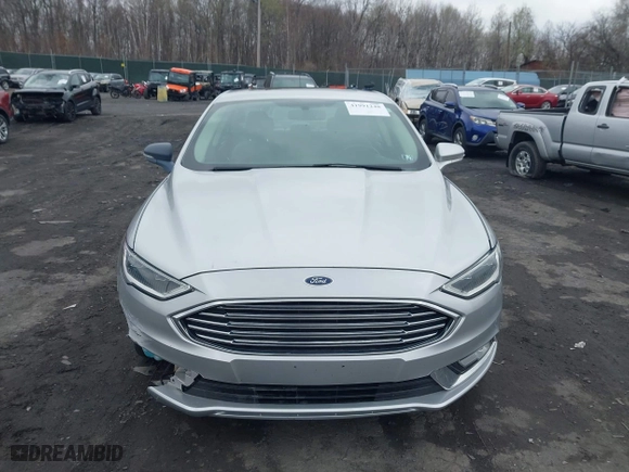 2018 Ford Fusion Titanium with VIN 3FA6P0D99JR139114, listed as a IAAI auction lot 41991248 with 142,324 mi miles. Bid and sale history available at carsss.com. Image 12.