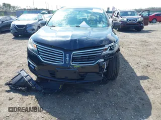 2016 Lincoln MKC Premier with VIN 5LMCJ1D96GUJ20759, listed as a IAAI auction lot 42019320 with 136,581 mi miles and . Bid and sale history available at DreamBid. Image 6.