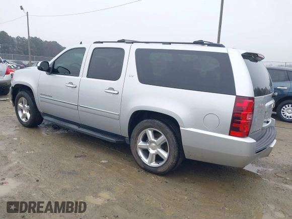 2014 Chevrolet Suburban LTZ with VIN 1GNSCKE05ER173446, listed as a IAAI auction lot 41047096 with 189,049 mi miles and . Bid and sale history available at DreamBid. Image 3.