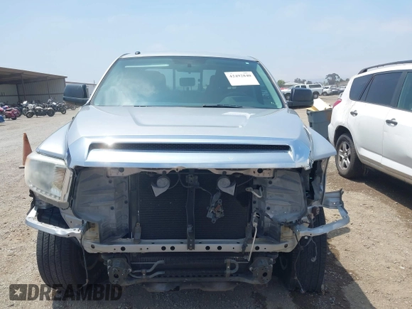 2016 Toyota Tundra SR z VIN 5TFRM5F1XGX099453, wystawiony jako IAAI lot #42492840 z przebiegiem 54 060 mil mil oraz . Historia ofert i sprzedaży dostępna na DreamBid. Obrazek 13.