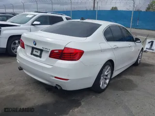 2014 BMW 5 Series 535i with VIN WBA5B1C53ED474843, listed as a IAAI auction lot 41779578 with 126,998 mi miles. Bid and sale history available at carsss.com. Image 4.