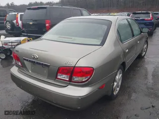 2002 Infiniti I35 Luxury with VIN JNKDA31A32T018726, listed as a IAAI auction lot 41784774 with 139,008 mi miles. Bid and sale history available at carsss.com. Image 4.