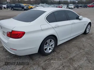 2013 BMW 5 Series 528i xDrive with VIN WBAXH5C5XDD106981, listed as a IAAI auction lot 42012477 with 140,259 mi miles. Bid and sale history available at carsss.com. Image 4.