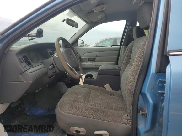 2004 Ford Police Interceptor Base w/3.27 Axle with VIN 2FAFP71W44X176595, listed as a Copart auction lot 72642164 with 136,019 mi miles and Salvage title. Bid and sale history available at DreamBid. Image 7.