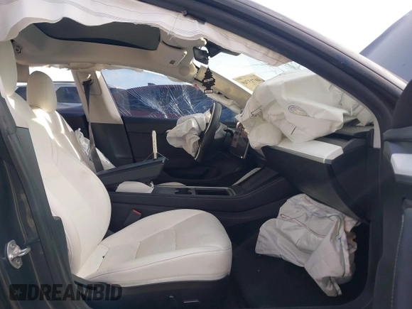 2021 Tesla Model 3 Long Range with VIN 5YJ3E1EB6MF975916, listed as a IAAI auction lot 40713749 with 29,593 mi miles and . Bid and sale history available at DreamBid. Image 5.