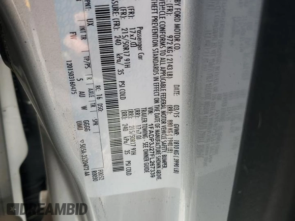 2015 Ford Focus Titanium with VIN 1FADP3J27FL267339, listed as a Copart auction lot 63395835 with 73,372 mi miles and Salvage title. Bid and sale history available at DreamBid. Image 12.