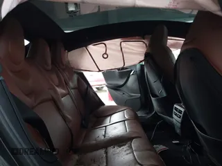 2021 Tesla Model S Long Range Plus with VIN 5YJSA1E28MF421655, listed as a IAAI auction lot 42407234 with 111,443 mi miles and . Bid and sale history available at DreamBid. Image 8.
