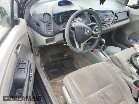2010 Honda Insight LX with VIN JHMZE2H59AS022362, listed as a Copart auction lot 59442435 with 161,009 mi miles and Salvage title. Bid and sale history available at DreamBid. Image 8.