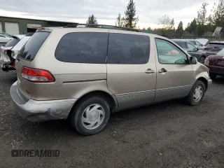 2002 Toyota Sienna LE with VIN 4T3ZF13C92U474786, listed as a Copart auction lot 83051724 with 195,429 mi miles and Salvage Title. Bid and sale history available at carsss.com. Image 3.