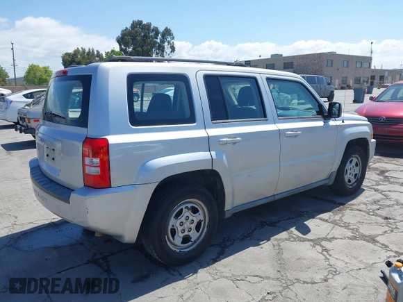 2010 Jeep Patriot Sport with VIN 1J4NT2GBXAD660180, listed as a IAAI auction lot 42146950 with 217,054 mi miles. Bid and sale history available at carsss.com. Image 4.