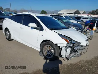 2021 Toyota Prius L Eco with VIN JTDKAMFU7M3148089, listed as a IAAI auction lot 41614915 with 119,725 mi miles. Bid and sale history available at carsss.com. Image 1.