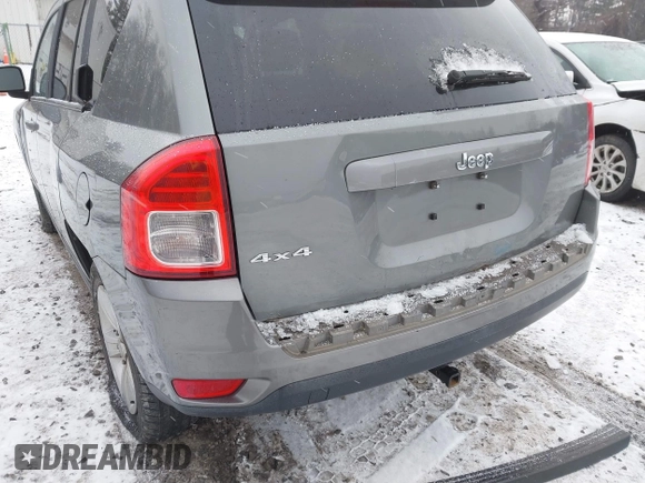 2013 Jeep Compass Sport with VIN 1C4NJDBB4DD280285, listed as a IAAI auction lot 41338884 with 119,714 mi miles. Bid and sale history available at carsss.com. Image 6.