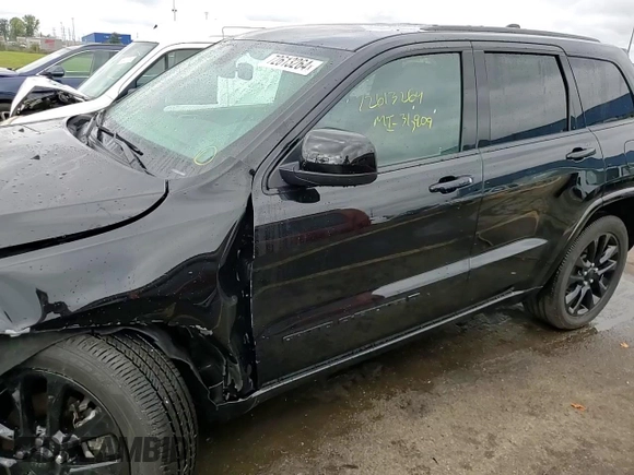 2022 Jeep Grand Cherokee WK Laredo E with VIN 1C4RJFAG6NC113430, listed as a Copart auction lot 72613264 with 31,909 mi miles and Salvage Title. Bid and sale history available at carsss.com. Image 14.