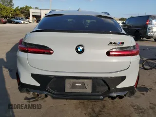 2022 BMW X4 M z VIN 5YM23EC00N9L35827, wystawiony jako Copart lot #87932635 z przebiegiem Nie podano mil oraz Szkoda całkowita • Salvage title. Historia ofert i sprzedaży dostępna na DreamBid. Obrazek 6.