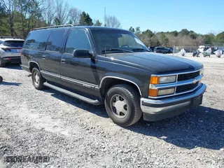 1999 Chevrolet Suburban with VIN 3GNEC16R0XG137834, listed as a IAAI auction lot 41853492 with 296,147 mi miles. Bid and sale history available at carsss.com. Image 1.