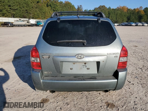 2006 Hyundai Tucson GLS with VIN KM8JN12D56U350295, listed as a Copart auction lot 77243594 with 192,335 mi miles and Salvage Title. Bid and sale history available at carsss.com. Image 6.