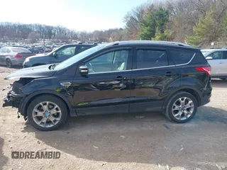 2016 Ford Escape Titanium with VIN 1FMCU9JX4GUB38303, listed as a IAAI auction lot 41788421 with 138,511 mi miles and . Bid and sale history available at DreamBid. Image 15.