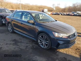 2016 Volkswagen Passat 1.8T S with VIN 1VWAT7A3XGC058412, listed as a IAAI auction lot 41309823 with 110,432 mi miles. Bid and sale history available at carsss.com. Image 1.