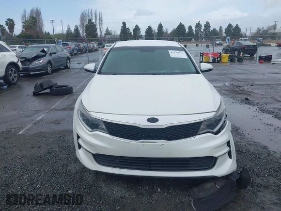 2016 Kia Optima LX with VIN 5XXGT4L30GG049534, listed as a IAAI auction lot 41770579 with 94,257 mi miles. Bid and sale history available at carsss.com. Image 13.
