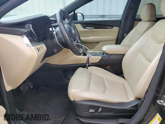 2017 Cadillac XT5 FWD with VIN 1GYKNARS9HZ237365, listed as a Copart auction lot 54190955 with 89,722 mi miles and Salvage Title. Bid and sale history available at DreamBid. Image 7.
