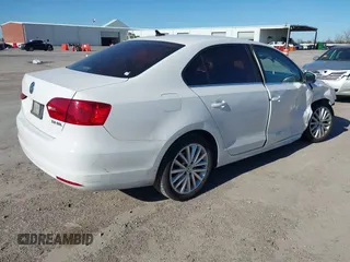 2012 Volkswagen Jetta Sedan SEL w/Sunroof with VIN 3VWLX7AJ4CM323376, listed as a IAAI auction lot 41722977 with 282,535 mi miles. Bid and sale history available at carsss.com. Image 4.