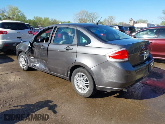 2011 Ford Focus SE with VIN 1FAHP3FN4BW118304, listed as a IAAI auction lot 42031650 with 60,031 mi miles and . Bid and sale history available at DreamBid. Image 3.