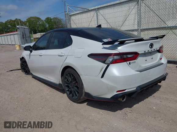 2022 Toyota Camry TRD with VIN 4T1KZ1AK6NU069341, listed as a IAAI auction lot 41881252 with 55,871 mi miles and . Bid and sale history available at DreamBid. Image 3.
