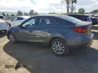 2014 Mazda 3 i Touring with VIN JM1BM1V74E1110673, listed as a Copart auction lot 52985505 with 86,032 mi miles and Salvage Title. Bid and sale history available at DreamBid. Image 2.