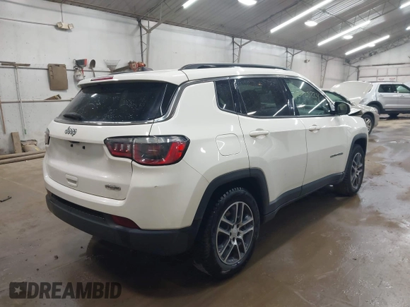 2019 Jeep Compass Latitude with VIN 3C4NJCBB8KT685910, listed as a IAAI auction lot 42423224 with 70,236 mi miles and . Bid and sale history available at DreamBid. Image 4.