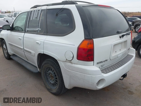 2003 GMC Envoy SLE with VIN 1GKDS13S532253648, listed as a IAAI auction lot 41850094 with 147,254 mi miles. Bid and sale history available at carsss.com. Image 3.