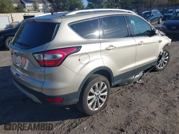 2017 Ford Escape Titanium with VIN 1FMCU0JD2HUD92675, listed as a IAAI auction lot 41834723 with 113,503 mi miles. Bid and sale history available at carsss.com. Image 4.