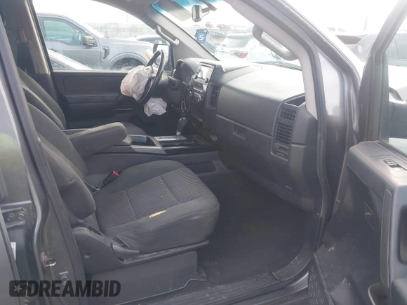 2014 Nissan Titan Pro-4X with VIN 1N6BA0EC3EN514358, listed as a IAAI auction lot 41636363 with 166,201 mi miles and . Bid and sale history available at DreamBid. Image 5.